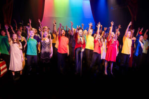 Students from Years 7-9 performing The Greatest Showman - the cast on stage singing