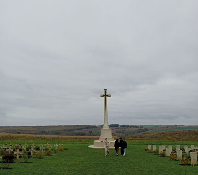 Students from The King Alfred School walk through Tyne Cot Cemetery in Belgium