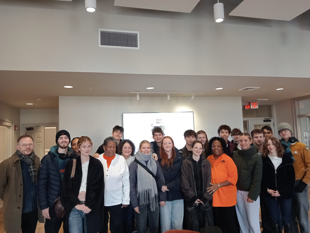 Students from The King Alfred School Sixth Form stand with Ms. Barbara Barge and Ms. JoAnne Bland, two black civil rights activists